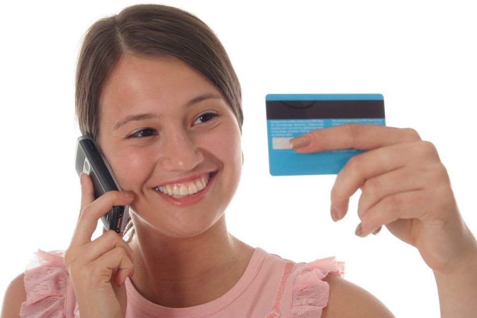 girl with credit card and mobile phone